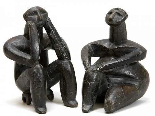 7000-летние неолитические статуэтки из Румынии, названные ?Мыслитель? и ?Сидящая женщина?